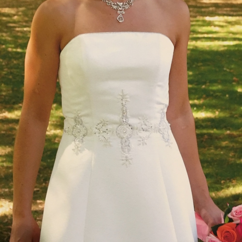 Wedding gown with rhinestone detail waist